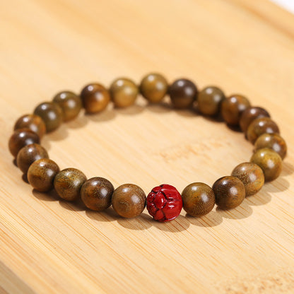 Handcrafted Green Sandalwood Prayer Bracelet – Lotus Charm Ornament